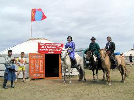 Mongolians gallop to felt tent polling booths